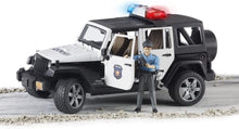 Carica l'immagine nel visualizzatore di Gallery, BRUDER Jeep Wrangler Unlimited Rubicon Polizia con poliziotto 02526